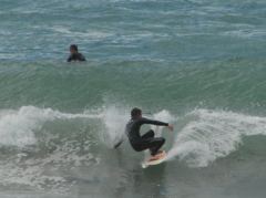 Surfer am Strand von Tauranga