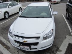 Unser Wagen, ein weisser Chevrolet Malibu